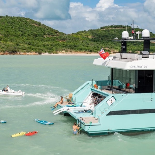 Catamaran at anchor in a turquoise bay