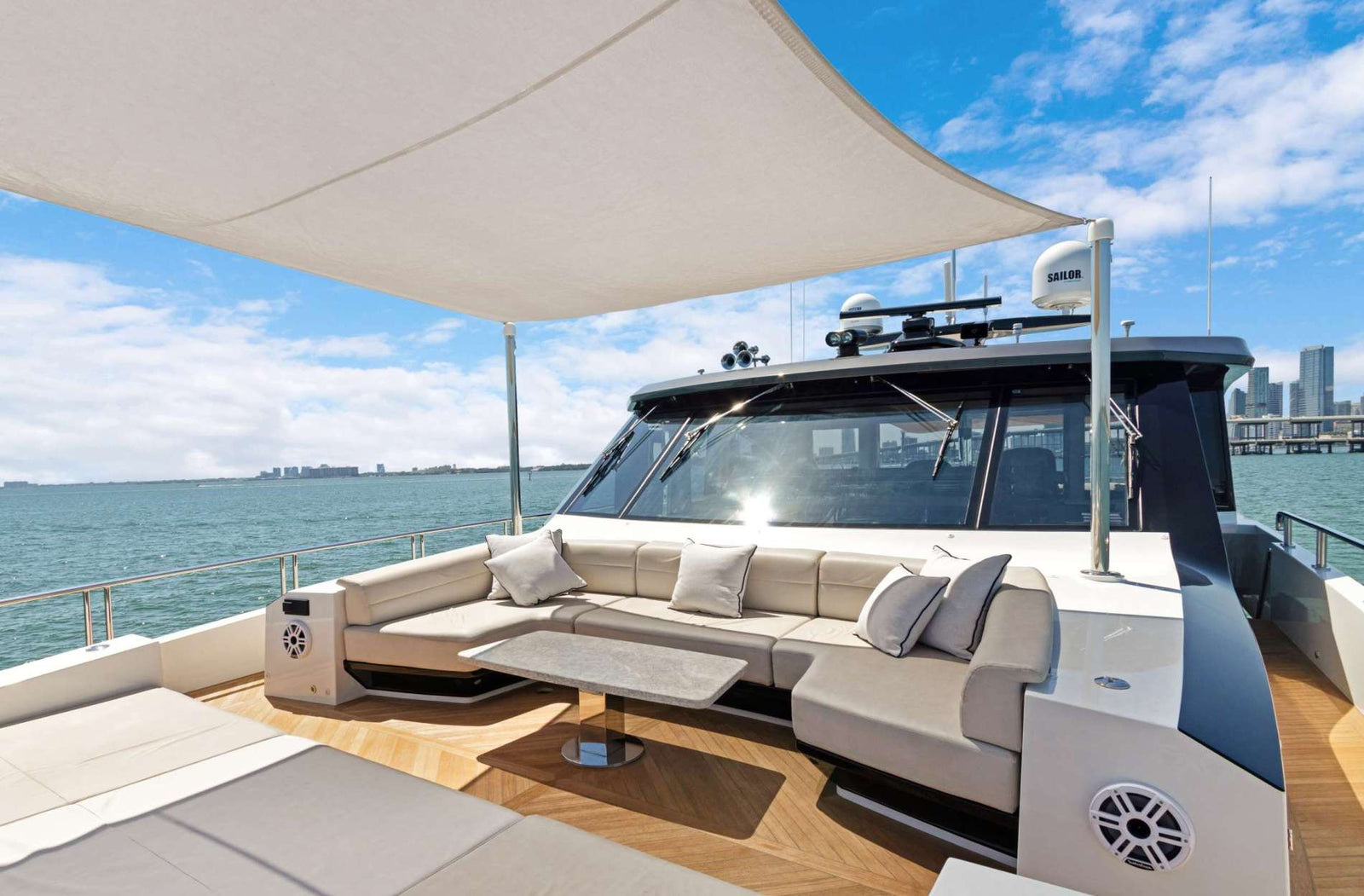 Shaded lounge on the flybridge of a motor yacht